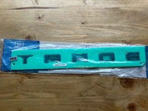 Placa de identificación de puerta levadiza cromada GM Chevrolet Tahoe 21-24 84701872 OEM nueva - Imagen 1 de 3