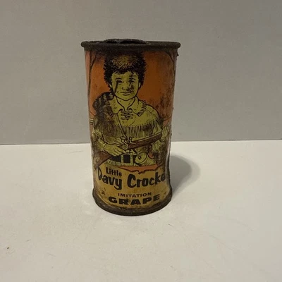 Publicidad de lata de refresco vintage Little Davy Crockett imitación uva acero  Foto 1 de 4