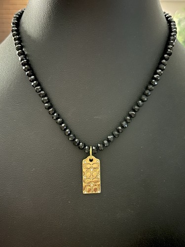 Collana stile girocollo Coach Tag Charm su perline nere