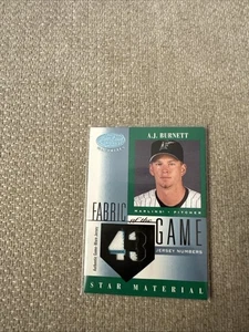 BLATT GEPRÜFT A.J. 2001 BURNETT STAR MATERIAL DUAL GAME WORN PATCH TRIKOT 12/43 - Bild 1 von 2
