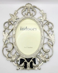 Marco de fotos ovalado Hollywood Regency glamour plateado pintado resina 7 pulgadas vintage - Imagen 1 de 9