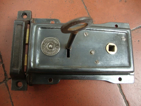 Antique restored reversible rim  lock with keep and key Cover