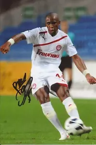 OLYMPIACOS * FOTO AZIONE 6X4 FIRMATA CLAUDE DIELNA + CERTIFICATO DI AUTENTICITÀ - Foto 1 di 1