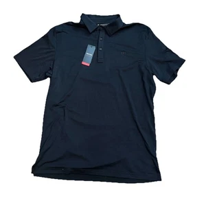 Neu mit Etikett Travis Mathew Herren L The Heater Polo S/S Shirt schwarz Stretch Idaho Club - Bild 1 von 6