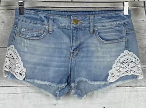 Pantalones Cortos American Eagle 4 Elastizados Desgastados Tiro Medio Corte Denim Detalle de Encaje - Imagen 1 de 11