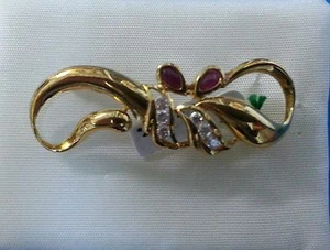 18K YELLOW GOLD FLAP BROOCH. Weight 5.35 gr. CIRCONS AND RUBIES. - Picture 1 of 1