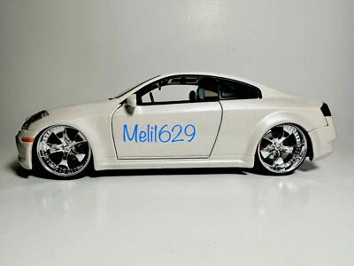 JADA DUB CITY 1/24 2003 INFINITI G35 blanco perla (SYMBOLIC SL-1) Foto 1 de 4