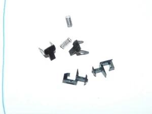 Minitrix 2 Kupplungen mit Feder u. Abdeckung sehr guter, gebr. Zustand (2501S) - Bild 1 von 2