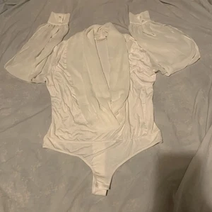 💥Eva Mendes Body weiß Langarm transparent - Bild 1 von 5