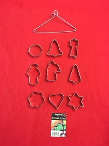 CHRISTMAS 9 Metal Cookie Cutters On Hanging Triangle Progressus 1997 - Picture 1 of 5