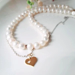 Amazing natural pearl necklace with a heart-shaped pendant on a chain - Picture 1 of 12