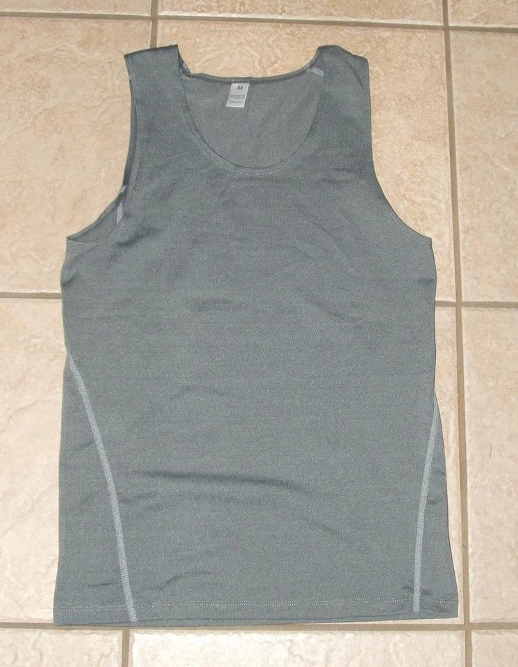 Camiseta sin mangas gris oscuro talla Jr mediana informal elástica atlética de secado rápido Foto 1 de 1