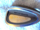 A "Used" Knight In-Sync, Stainles Bi-Metal, 56 Degree. Cavity Back Sand Wedge!