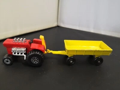 P611-MATCHBOX TP2-A RED MOD TRACTOR AND HAY TRAILER - Image 1 of 4