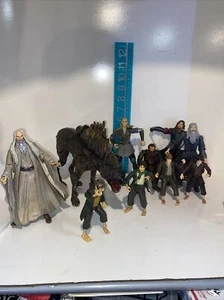 Rare 10 figurine IL SIGNORE DEGLI ANELLI LOTR 2001 MARVEL Warg Frodo Gandolf ��Altro - Foto 1 di 12