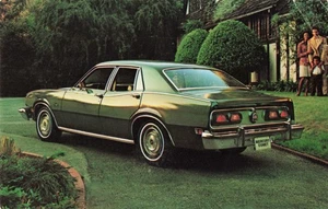 1975 Mercury Comet 4-door Postcard Dealer Penoyer Central Square, NY  K10 - Picture 1 of 2