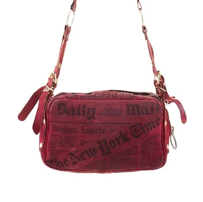 Bolsa de ombro G. Plaza década de 1970 estampa de jornal camurça borgonha - Imagem 1 de 4