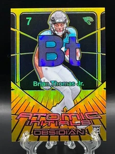 Brian Thomas Jr. 2024 Panini Obsidian Atomic Initials Rookie Gold/10 RC #20 - Imagen 1 de 2