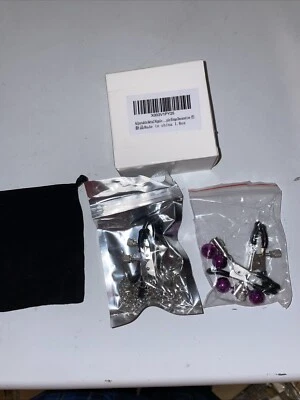 Juego decorativo de anillos de pezón de metal ajustables Foto 1 de 4