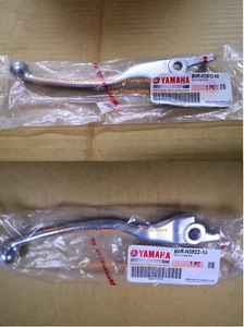 (JUEGO) NUEVAS PALANCAS DE FRENO ORIGINALES YAMAHA IZQUIERDA+DERECHA para Yamaha Zuma 125 2022 2023 - Imagen 1 de 4