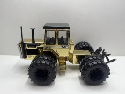 1/32 ERTL Massey Ferguson 1505 Tractor GOLD CHASE - Image 1 of 4