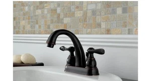 Grifo de baño Delta de dos manijas en bronce frotado con aceite - Imagen 1 de 9