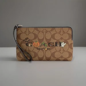NWT! COACH Large Corner Zip Wristlet In Signature Canvas With Halloween C6037 - Picture 1 of 4