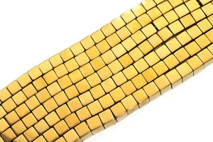 T5-10 - 4 MM HÄMATIT WÜRFEL STRANG GOLDFARBEN - Bild 1 von 1