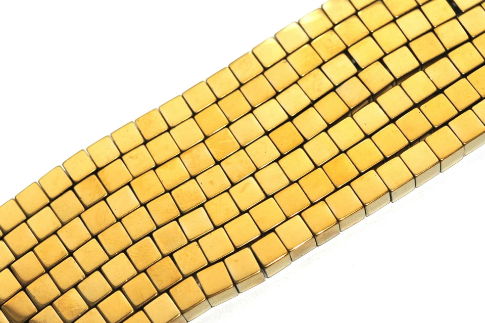 T5-10 - 4 MM HÄMATIT WÜRFEL STRANG GOLDFARBEN - Bild 1 von 1
