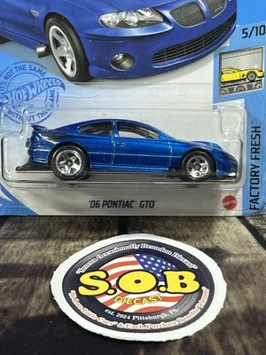 Pontiac GTO 2006 tarjeta azul Hot Wheels diecast sellado usado casi nuevo estado Foto 1 de 4