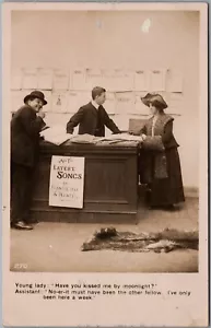 RPPC 1906 Sheet Music Sales Clerk Latest Songs Francis, Day & Hunter by Bamforth - Bild 1 von 2