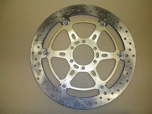 DISCO FRENO ANTERIORE FLOTTANTE SUNSTAR D.320 X 64 X 4 STX GUZZI / APRILIA - Foto 1 di 1