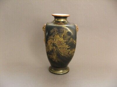 A Japanese Satsuma Black And Gold Painted Vase, Meiji , Signed. Applied Masks. • 24£