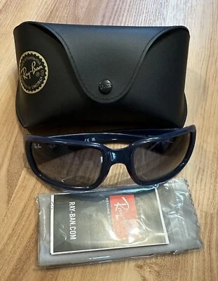 Gafas de sol Ray Ban RB 4338 marco azul pulido gris claro degradado lentes Foto 1 de 4
