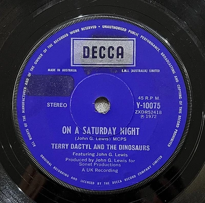 7" 45 - Terry Dactyl & The Dinosaurs: On A Saturday Night +Going Round The World - Image 1 of 4