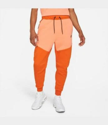 Pantalones de chándal Nike Tech polar con puños fogata naranja CU4495-893 PEQUEÑO-ALTO ST Foto 1 de 4