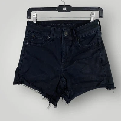 Pantalones cortos American Eagle para mujer 4 tiro alto corte desgastado siguiente nivel elástico De Foto 1 de 4