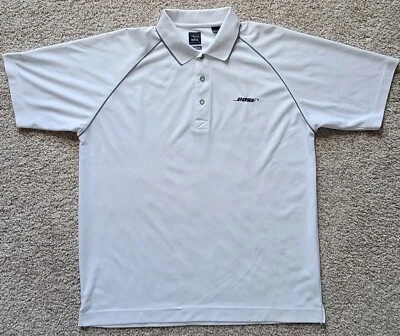 Camisa polo de golf blanca con logotipo Bose, marca Page & Tuttle, versión Cool Swing grande Foto 1 de 4