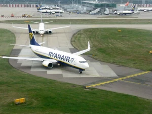 Photo 6x4 Ryanair at London Stansted Airport Looking towards the main ter c2019 - Picture 1 of 1