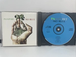 passport sky blue CD WOU-9177 VG/NM 70’s Prog Jazz 2001 Reissue - Imagen 1 de 3