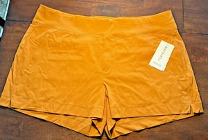 Athleta Trekkie North Short Dusty Apricot Women Sz 24 Zipper Pockets - Bild 1 von 13