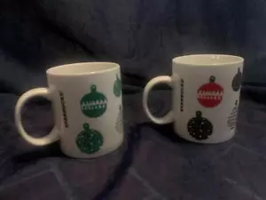 LOTE DE 2 tazas de café Starbucks 2016 adornos navideños rojo negro verde 12 oz. - Imagen 1 de 5
