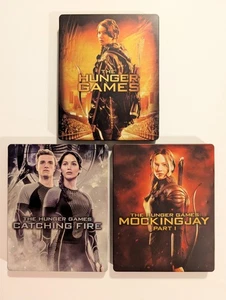 The Hunger Games, Catching Fire, Mockingjay Part  1 Steelbook Best Buy Exclusive - Picture 1 of 16