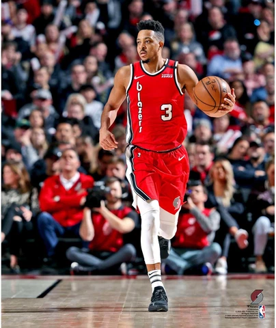C.J. McCollum Portland Trailblazers Unsigned Dribbling Photograph Cover