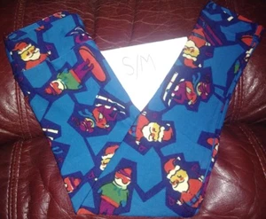Lularoe Holiday Christmas Leggings new S/M Santa Santa's on skies and snowboards - Picture 1 of 2