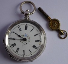 Pretty antique solid silver fob pocket watch with fancy gilt dial. Working