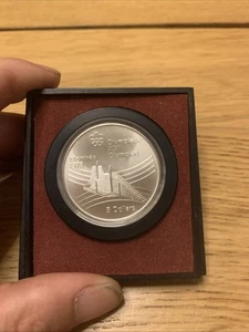 $5 CANADA 1976 Queen Elizabeth II Olympics Montreal Village Silver Coin - Picture 1 of 4