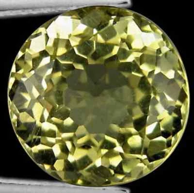 9.03 cts Rare Natural Round-cut FlashingFire Yellow VVS Scapolite (Africa) - Image 1 of 4