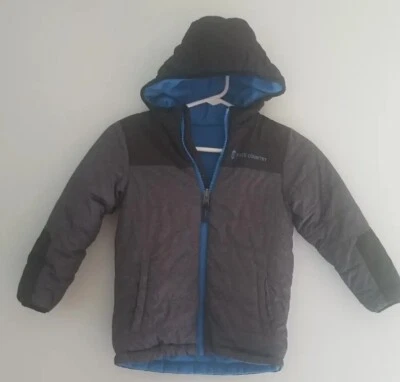 Chaqueta acolchada con capucha reversible Free Country para niño. Talla M 5/6. 100% poliéster. Foto 1 de 4