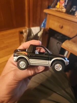 Black Toyota Rav 4 Cabriolet Kinsmart 1/32 Scale Diecast Vehicle Pull Back - Image 1 of 4